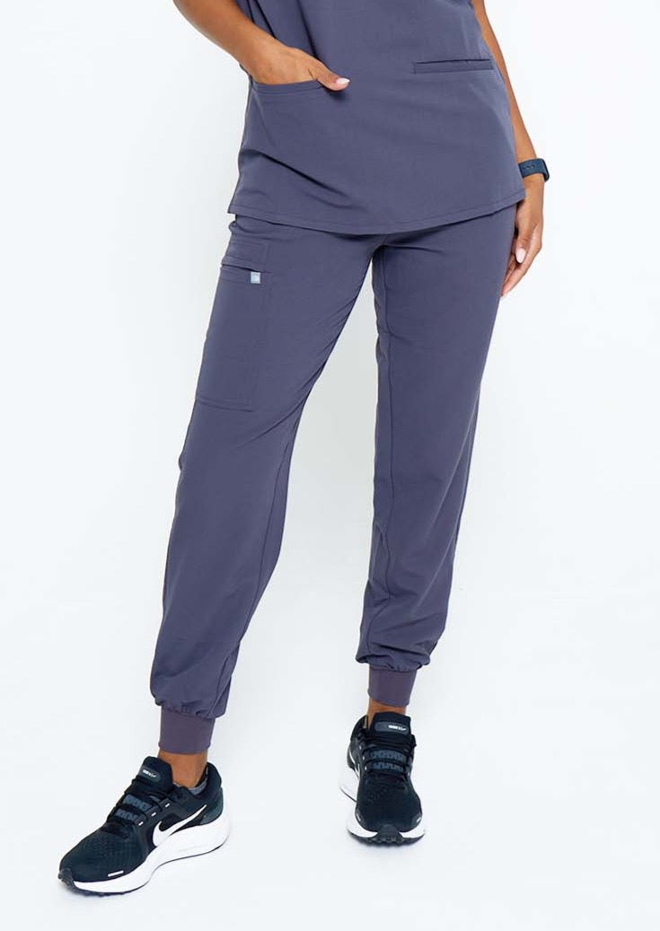 Model wearing scrubs.