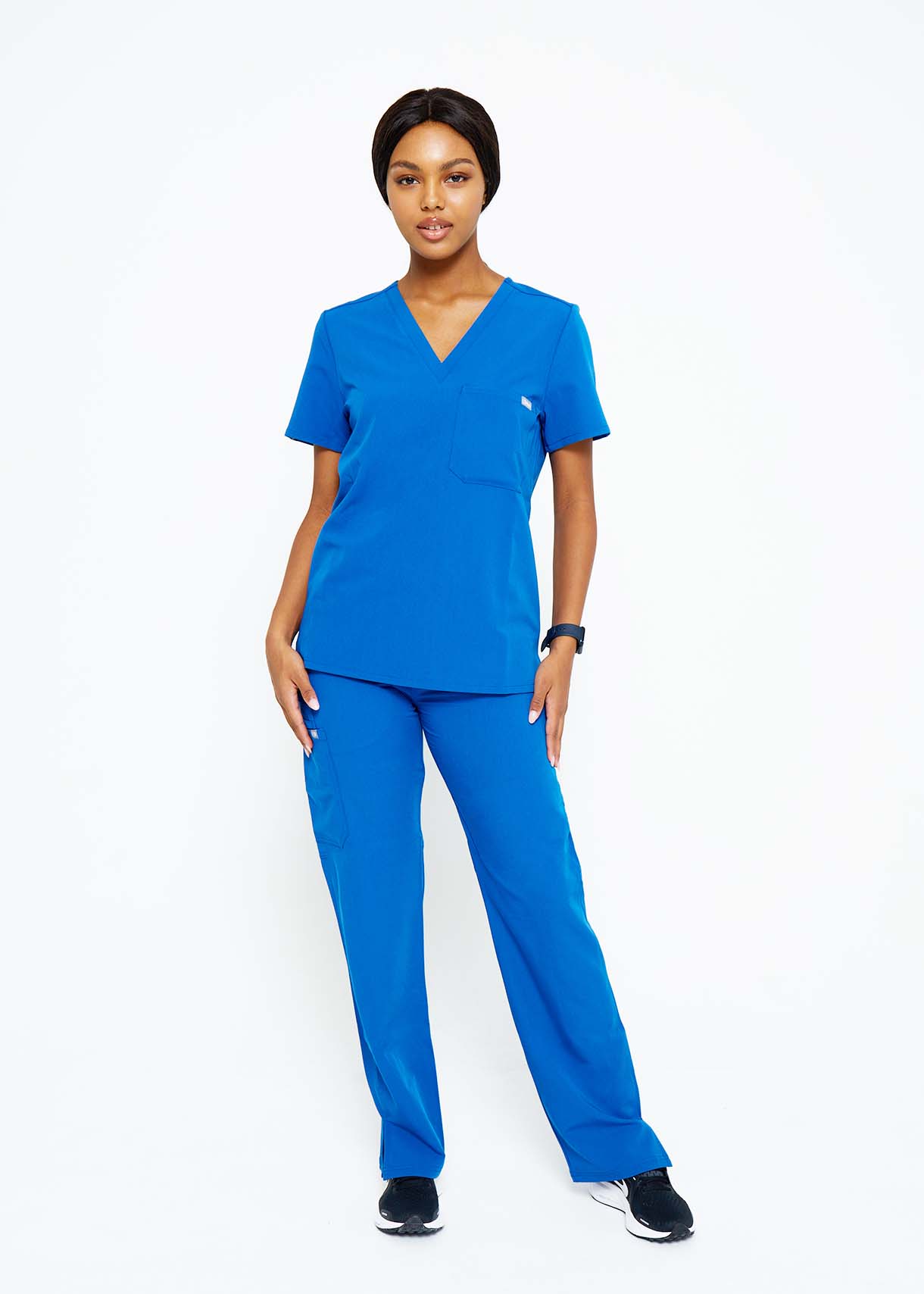 Model wearing scrubs.