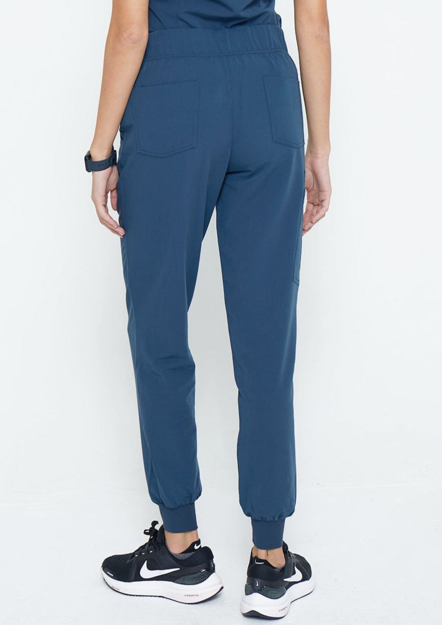 Model wearing scrubs.