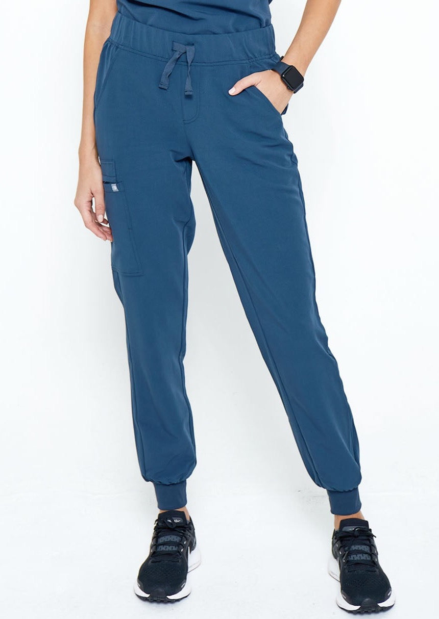 Model wearing scrubs.