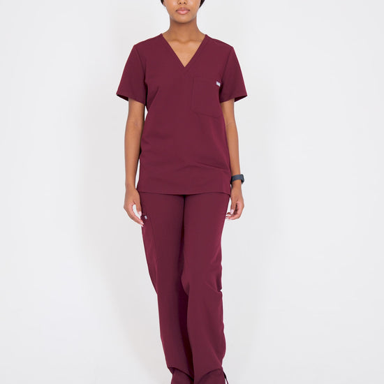 Video of model walking in scrubs.