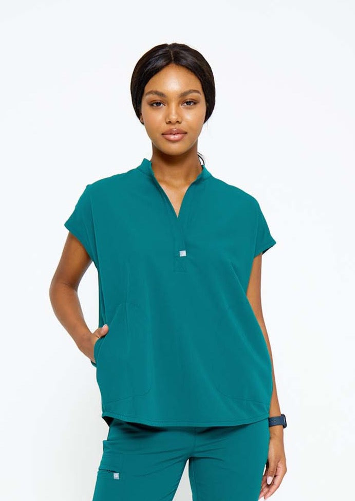 Model wearing scrubs.