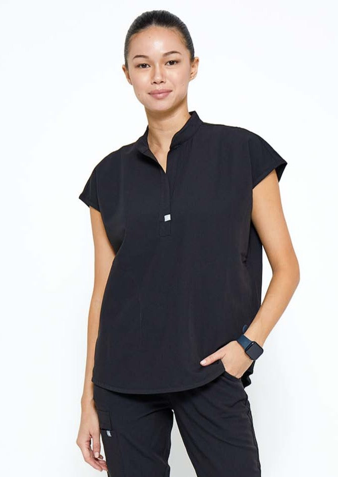Model wearing scrubs.